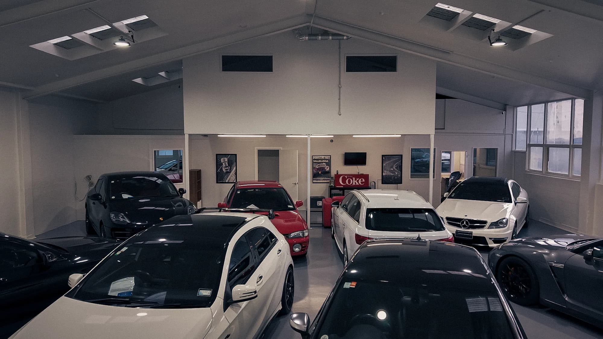 Wide interior view of the Auto Luxe showroom at 27 Watts Road, Sockburn